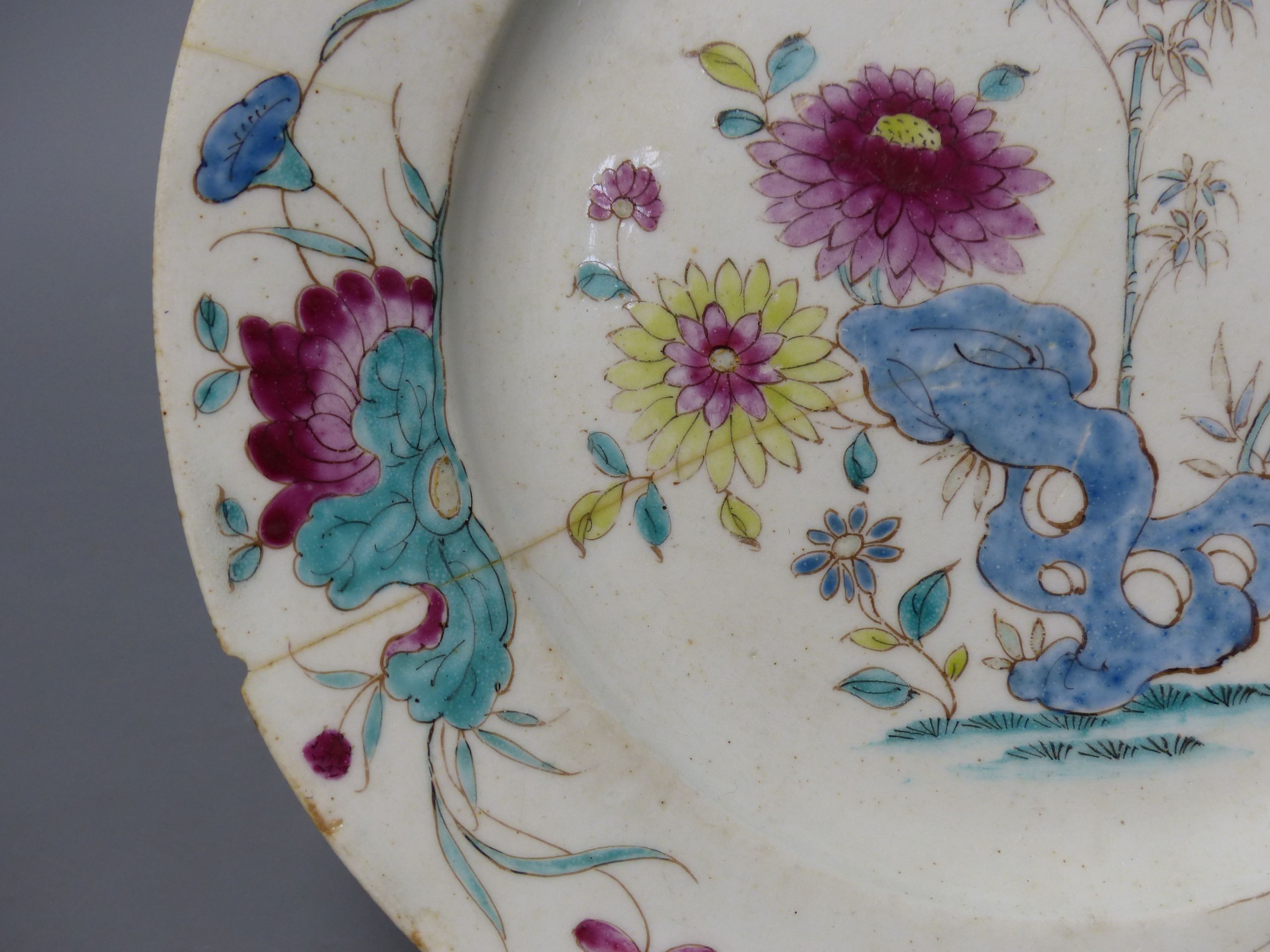 A Bow circular plate painted in famille rose style with chrysanthemums, c.1755, diameter 23cm